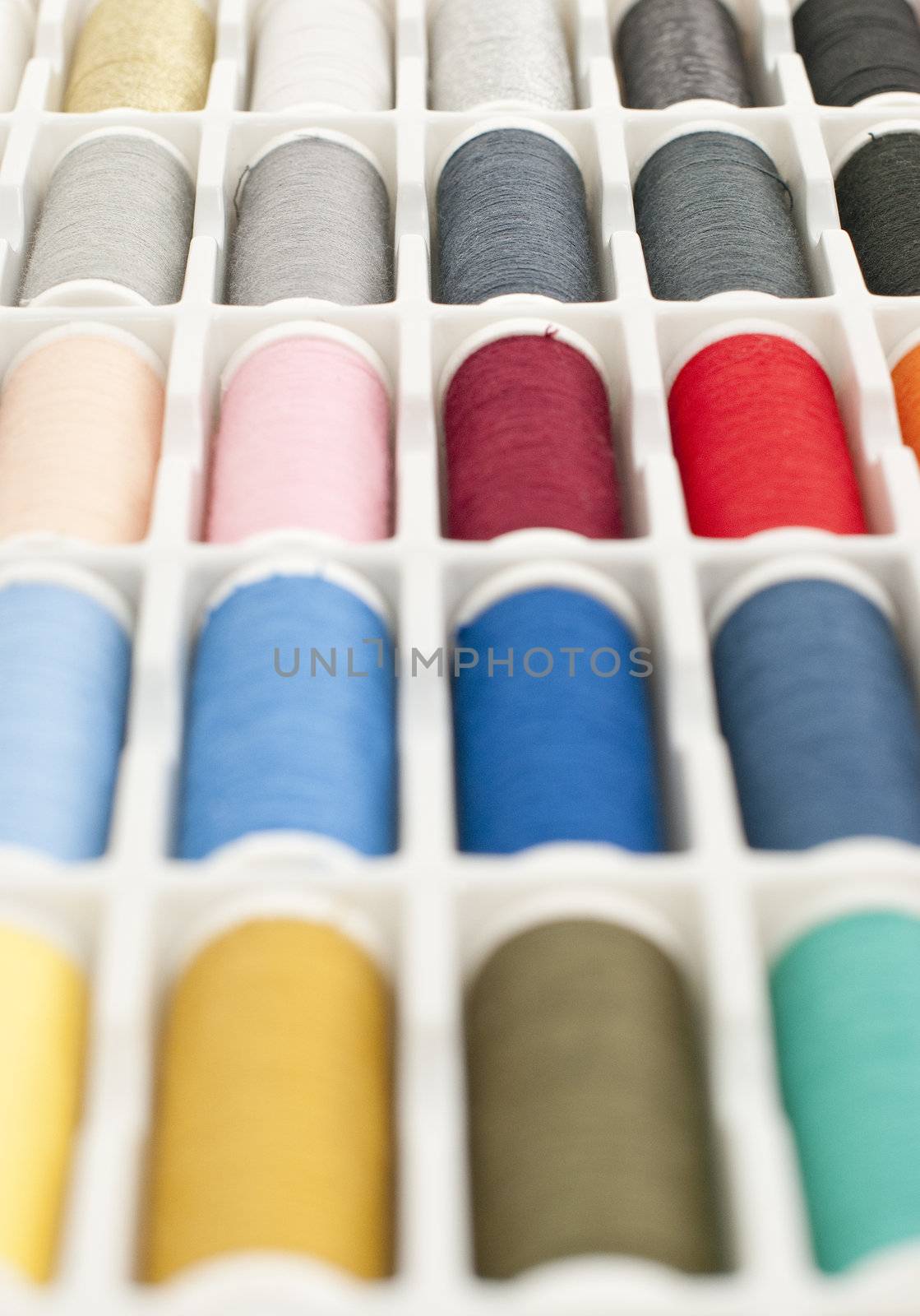 Colorful Spools of sewing thread.