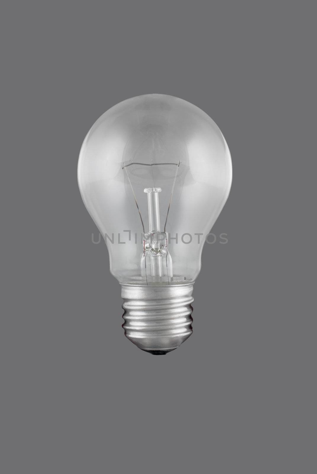 A light bulb isolated on a solid color background.