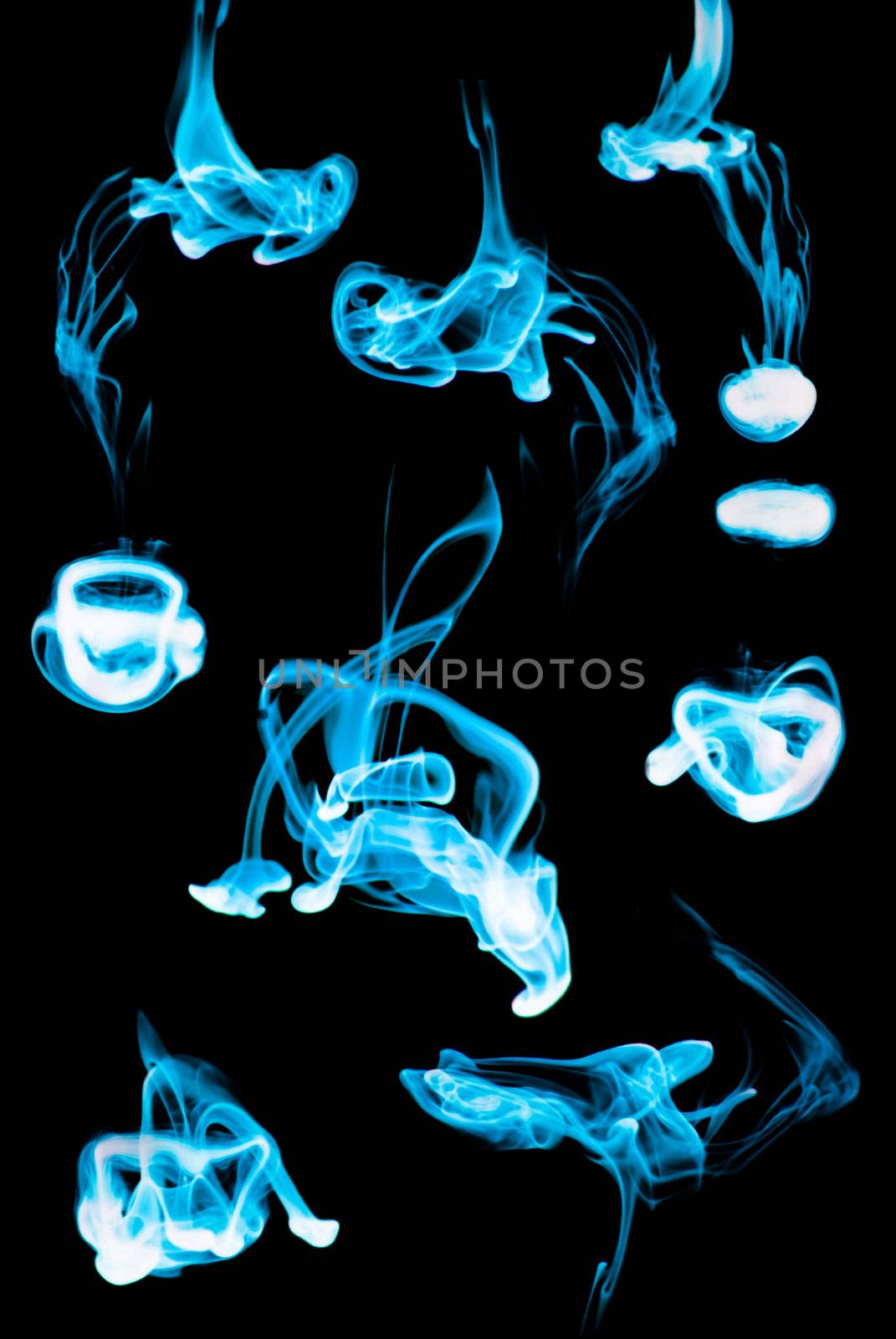 Abstract ink background flow in water on a black background.