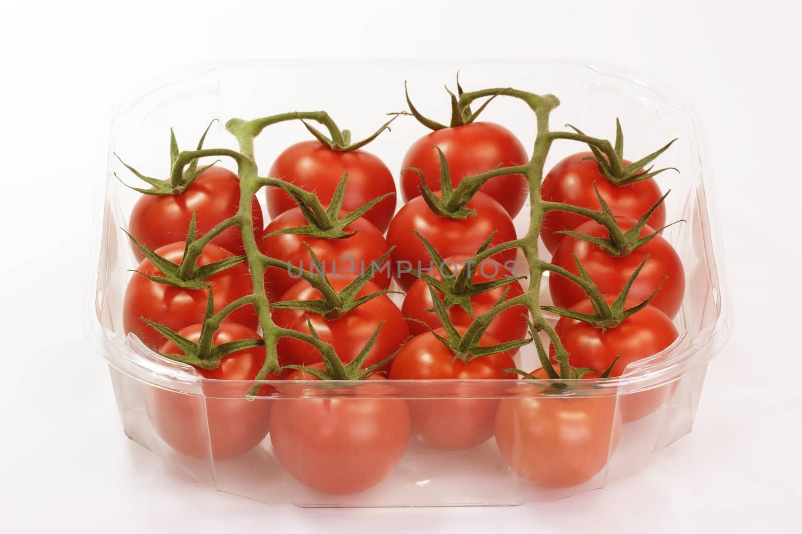 Fresh tomatoes  on bright background
