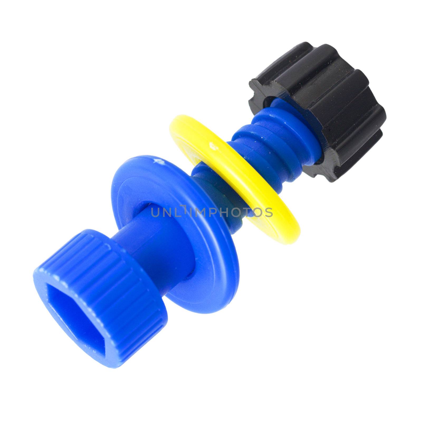 Blue plastic bolt wiht yellow and black nuts on the white background