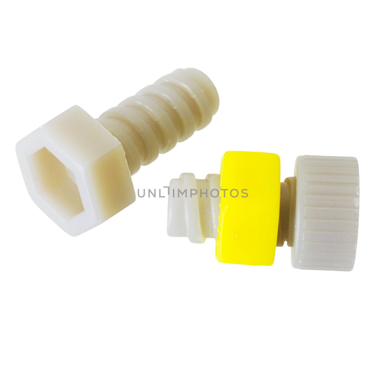 Grey nut's and yellow bolt on the white background