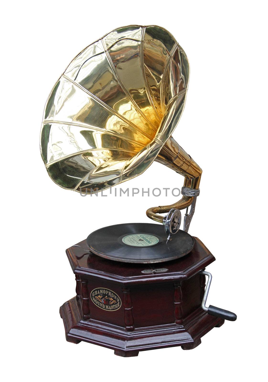 An old brass horn gramophone and record.