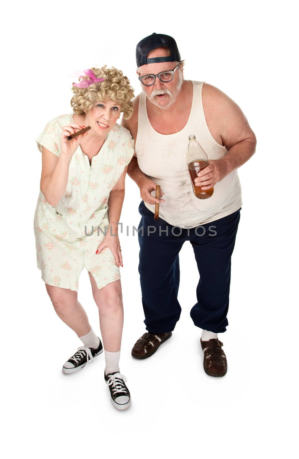 Curious older couple with poor wardrobe and cigars