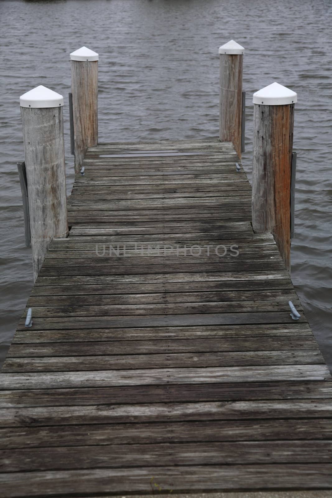 Wooden dock extends into a lake