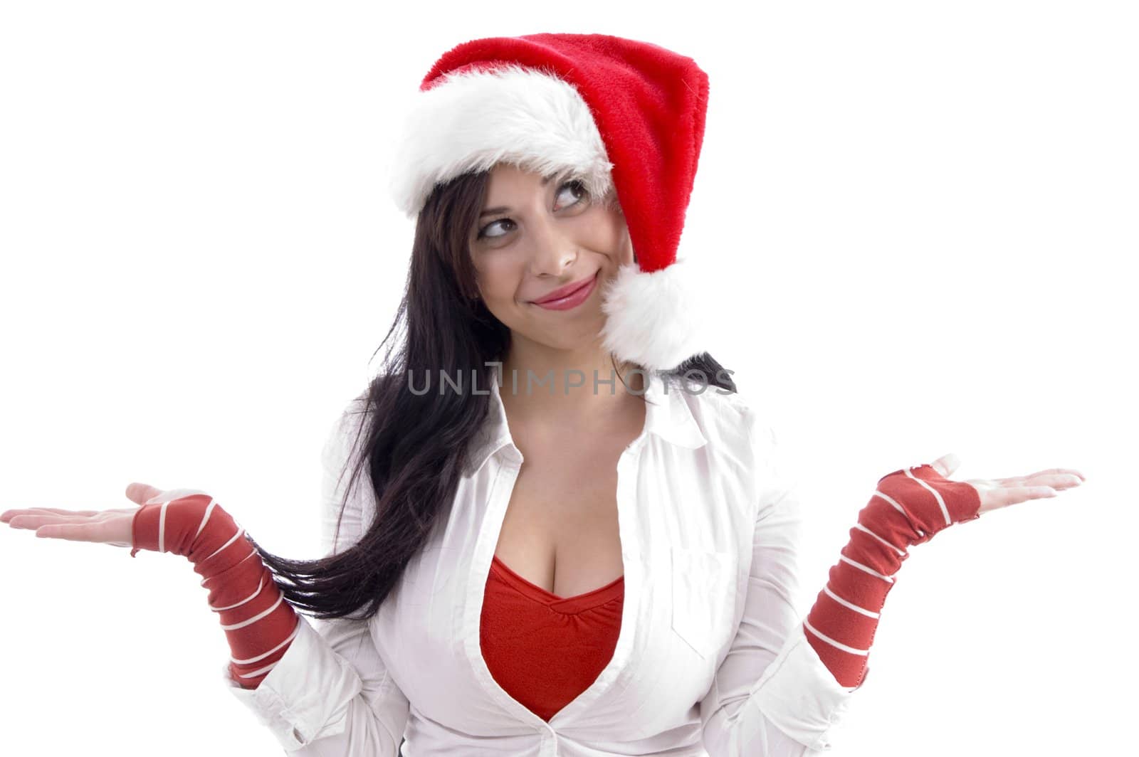 smiling woman wearing christmas hat with open palms by imagerymajestic