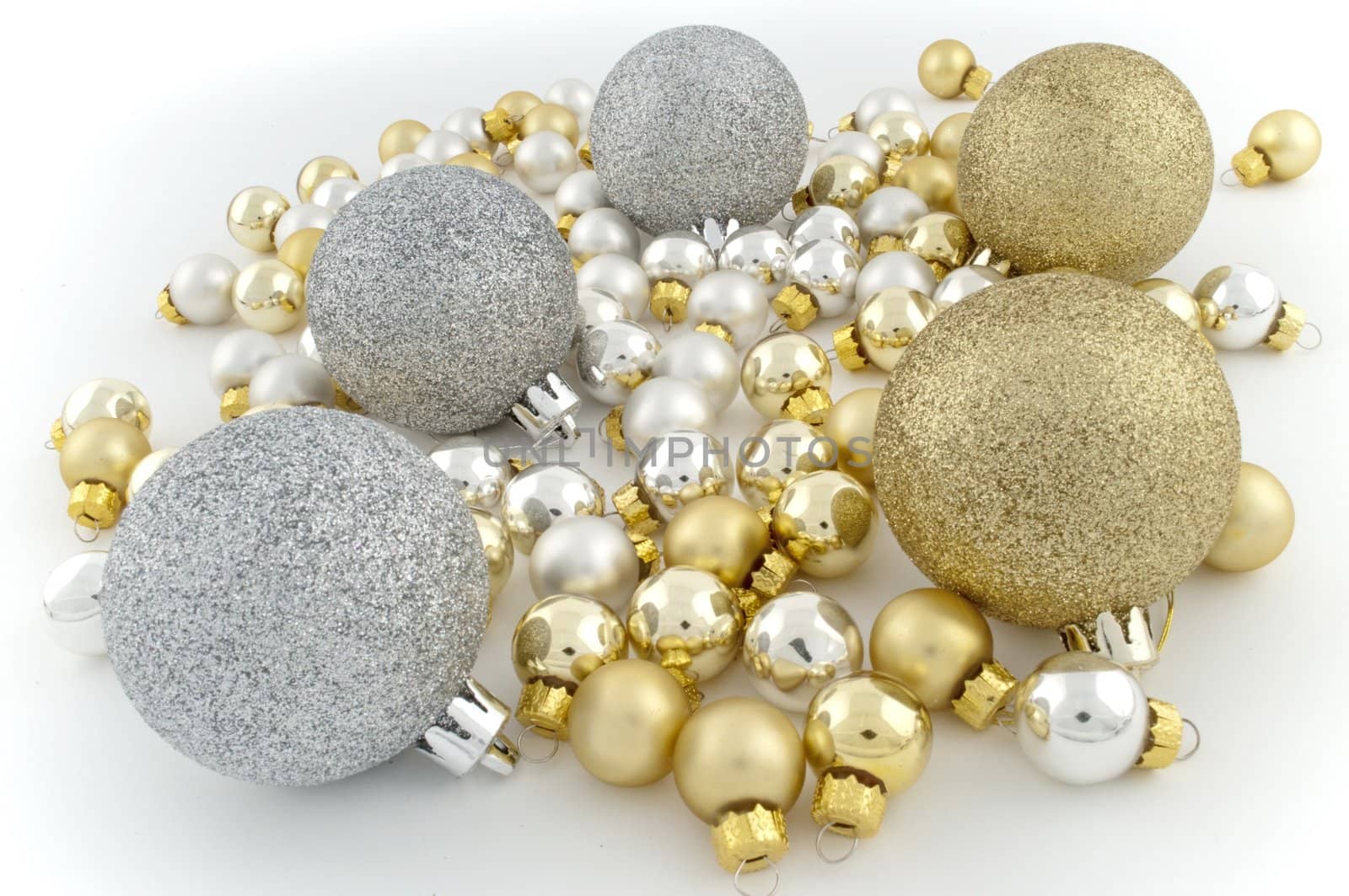 Full pack of silver and golden christmas balls on white