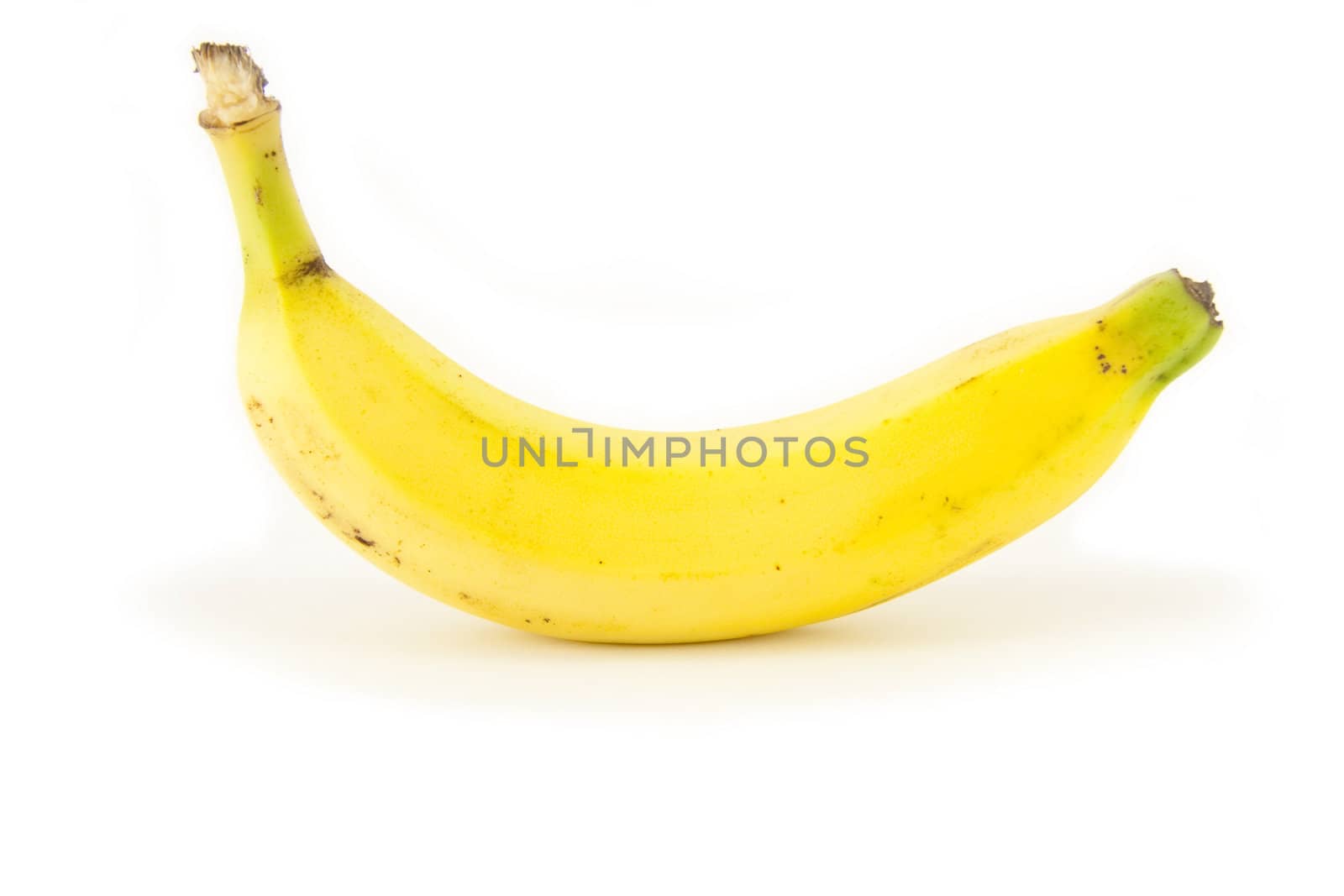 A single banana on white background