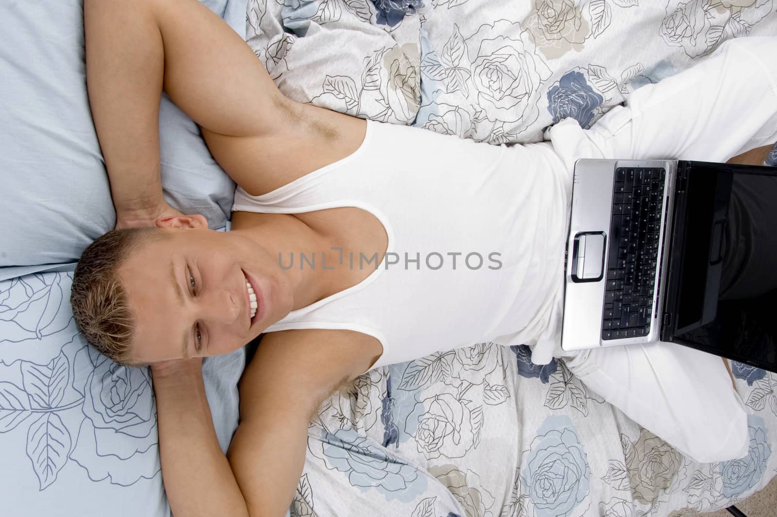 tired man taking rest in bed