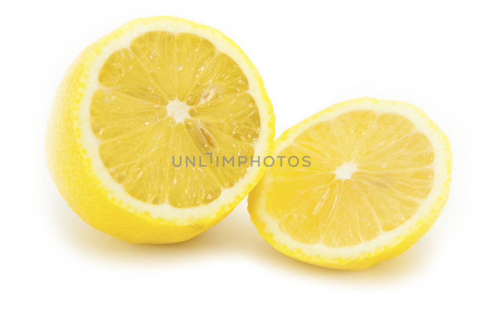 Sliced Fresh Yellow Lemon on white