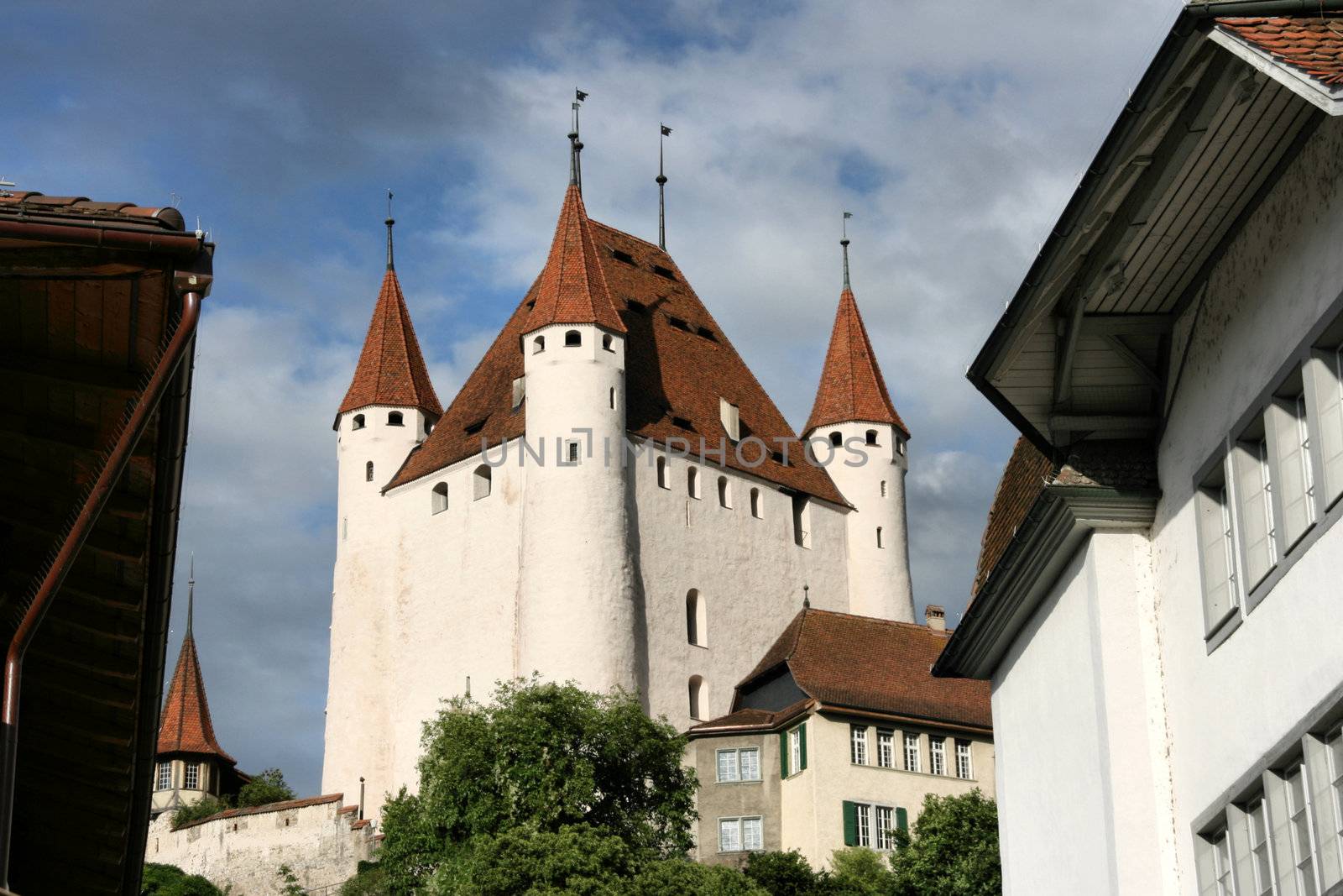 Old castle in Thun, next to Aare river. Switzerland town.