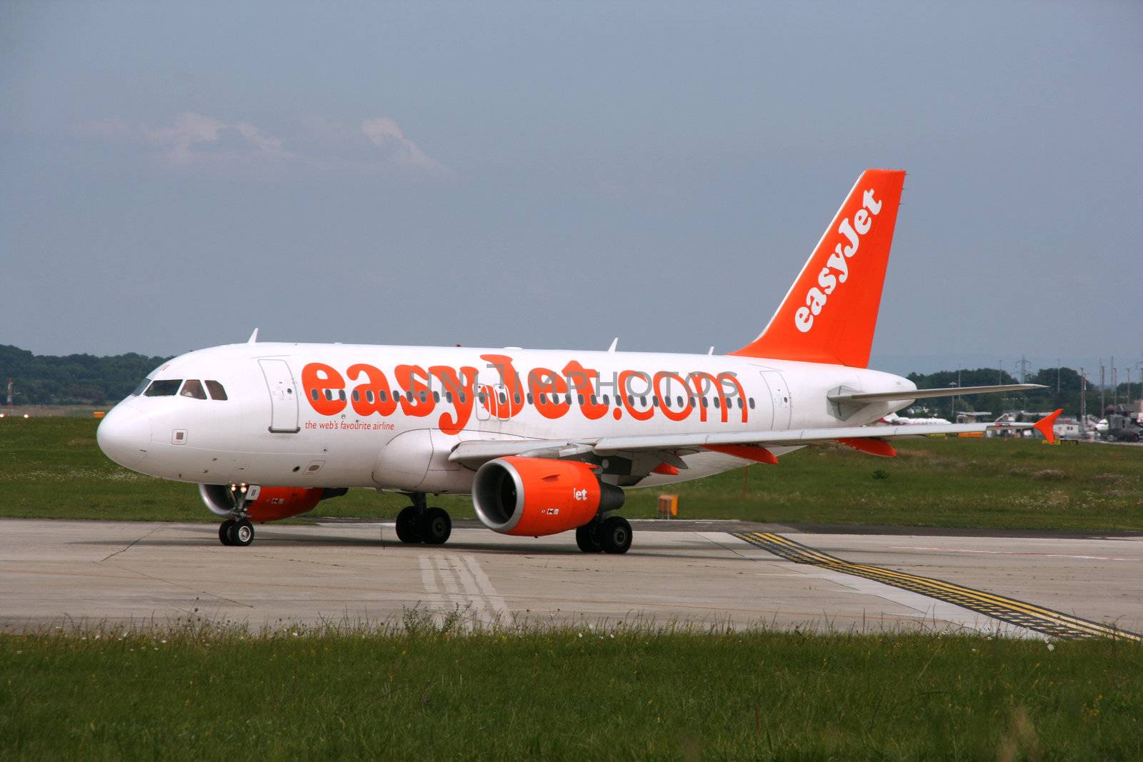 GENEVA, SWITZERLAND - 16 AUGUST 2008: Airbus A319 jet aircraft operated by easyJet at Geneva Cointrin International Airport on August 16, 2008. easyJet is the fourth biggest airline in the world in terms of international passengers carried.