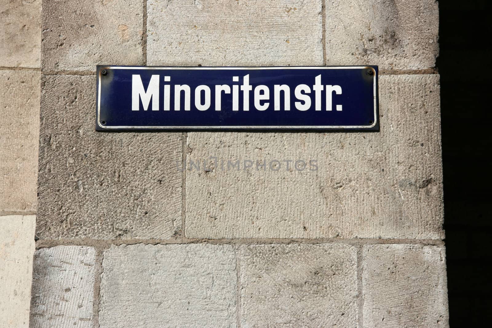 Street sign in Cologne, Germany. Architecture detail.