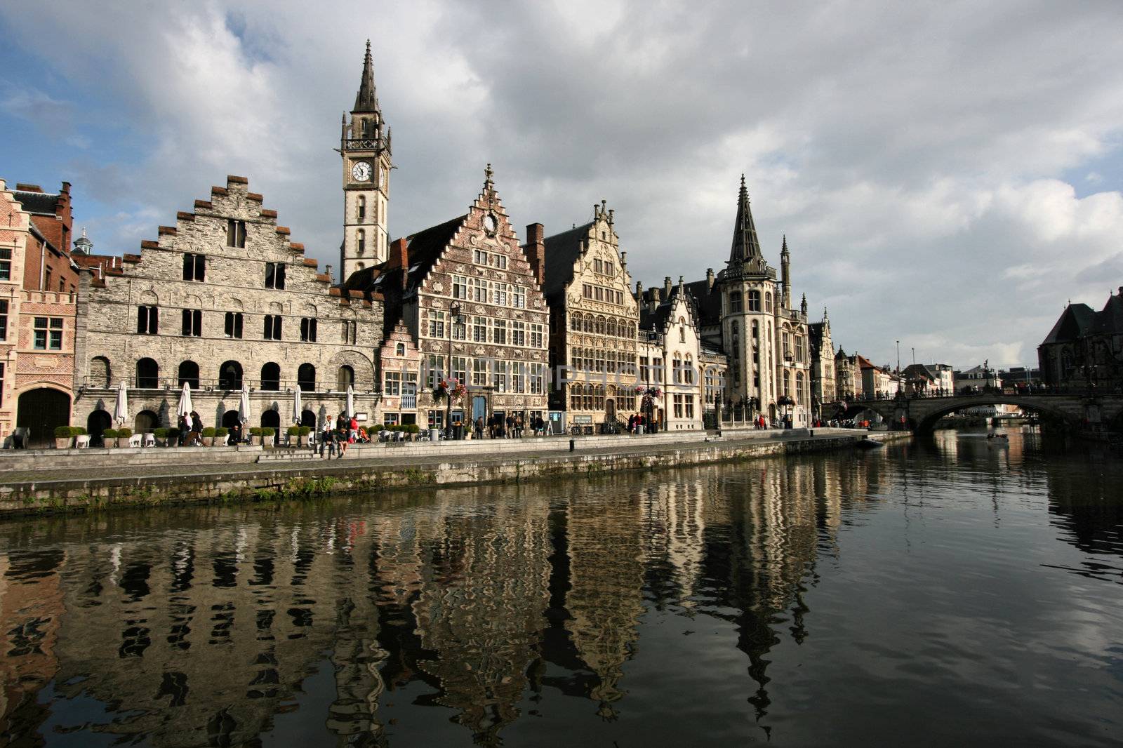 Beautiful Belgian town of Ghent and its reflection in river Leie water
