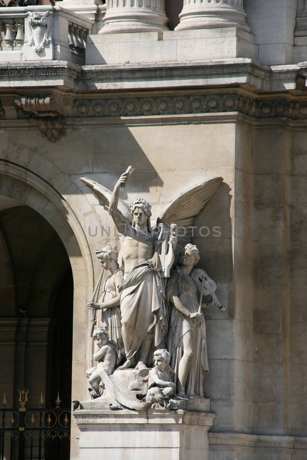 Instrumental Music allegory - sculpture by Jean-Baptiste Claude Eugene Guillaume in facade of Opera Garnier, Paris