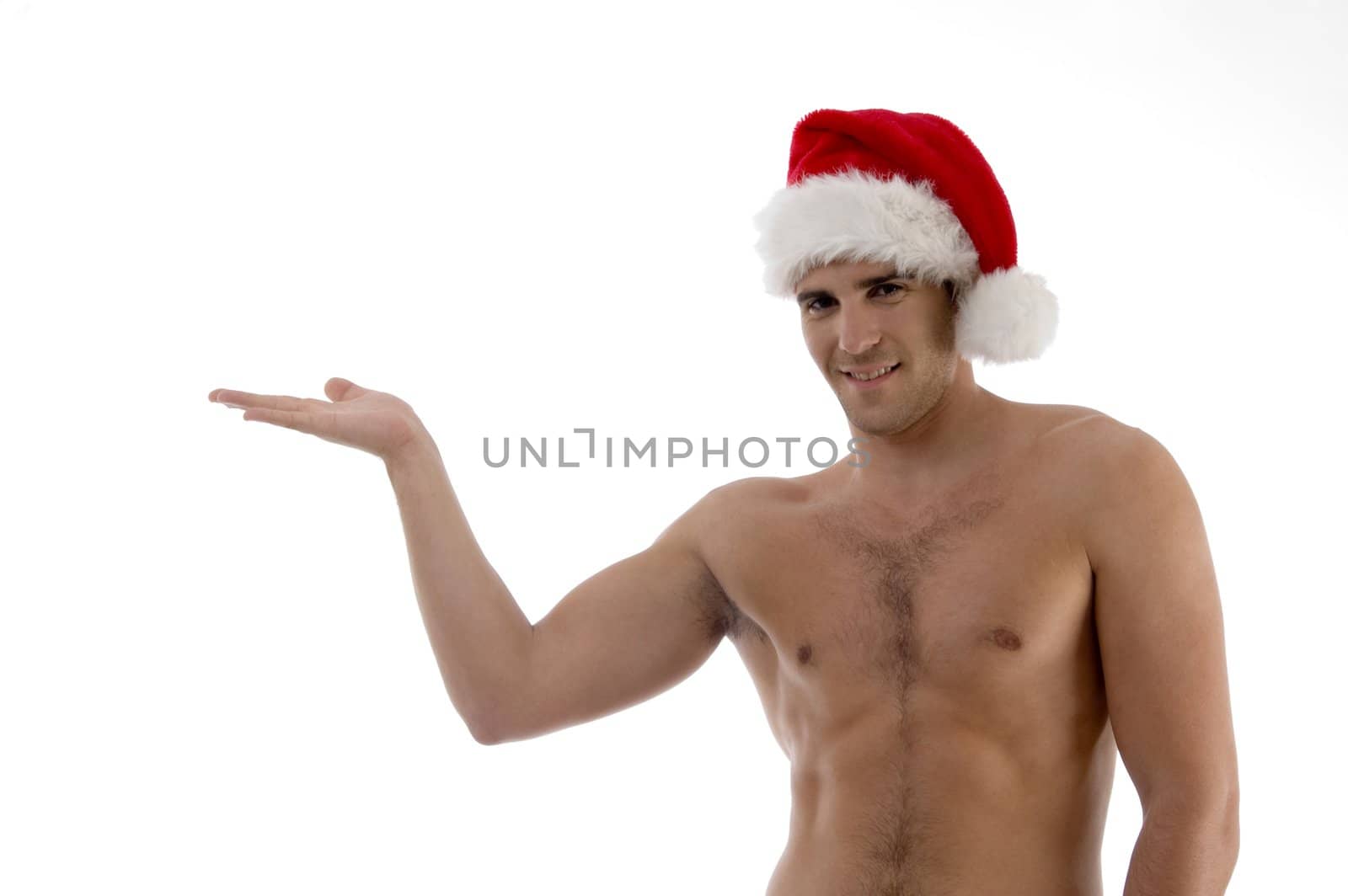 young guy posing in christmas hat with hand gesture against white background