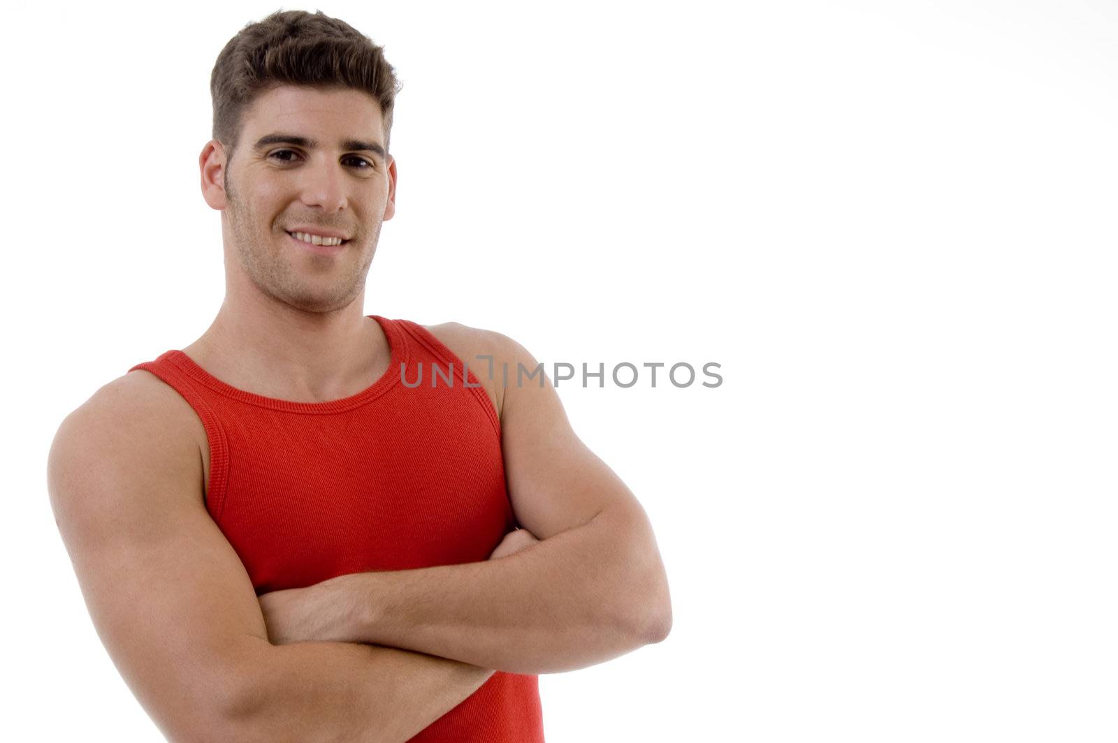 handsome male model posing against white background