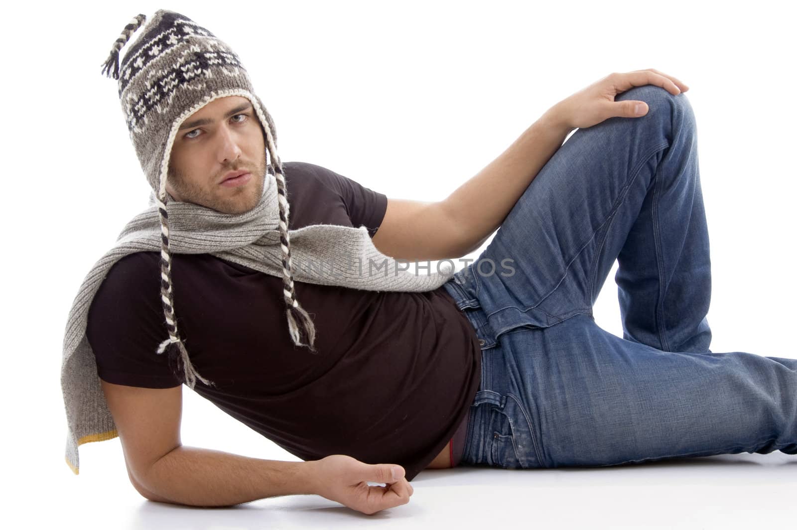 cool handsome guy wearing woolen cap against white background