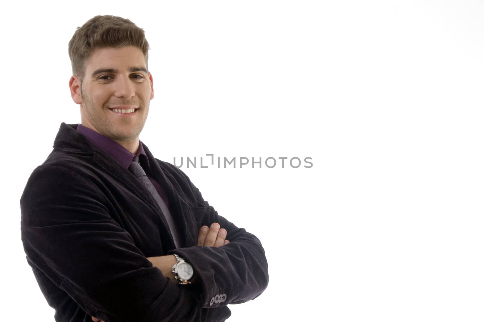 businessman posing with arms crossed on an isolated background