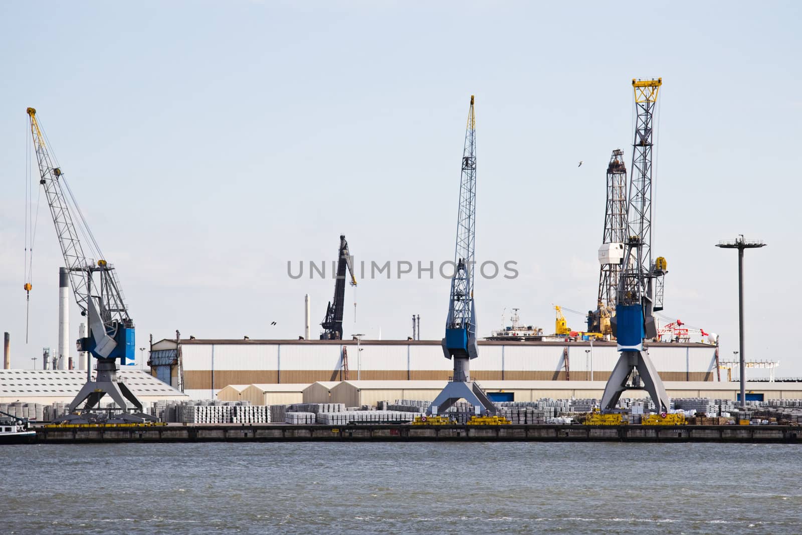 Industrial cranes and transshipment at the riverside