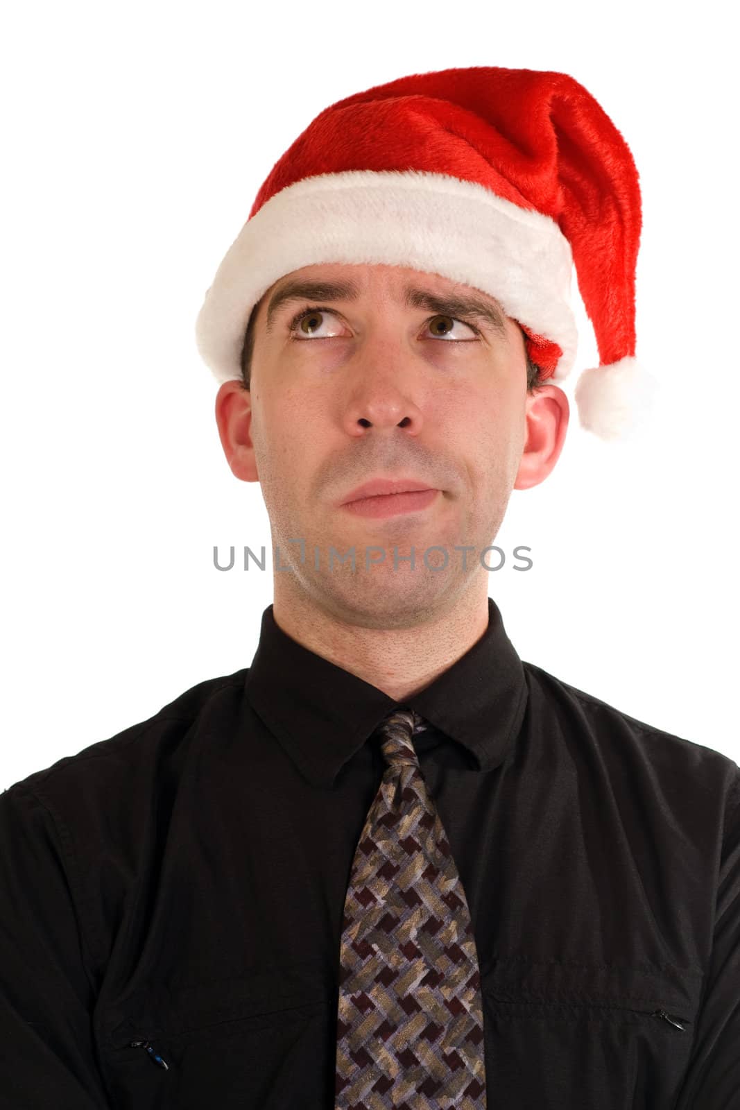 A puzzled looking employee wearing a santa cap