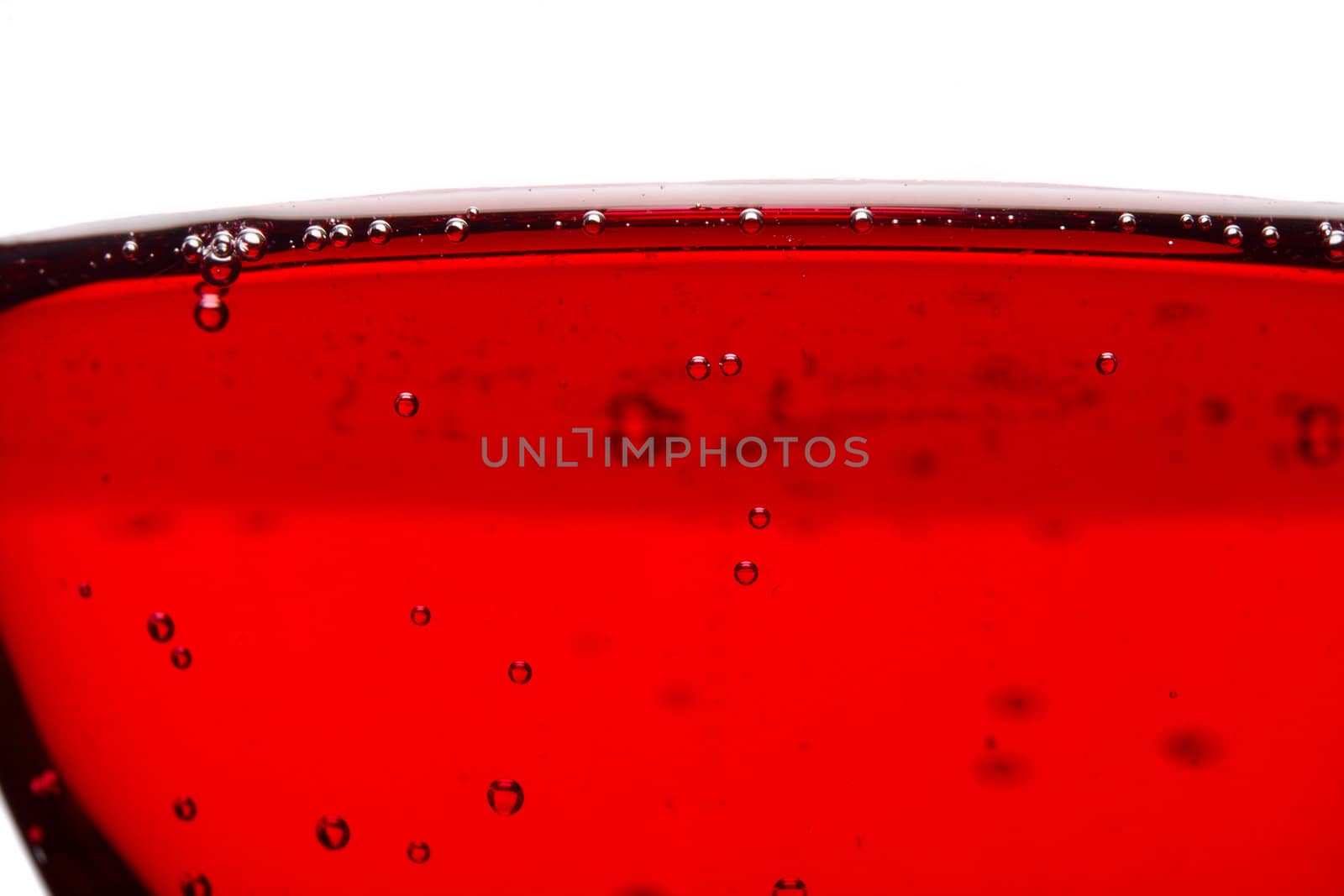 close-up red currant wine, isolated on white