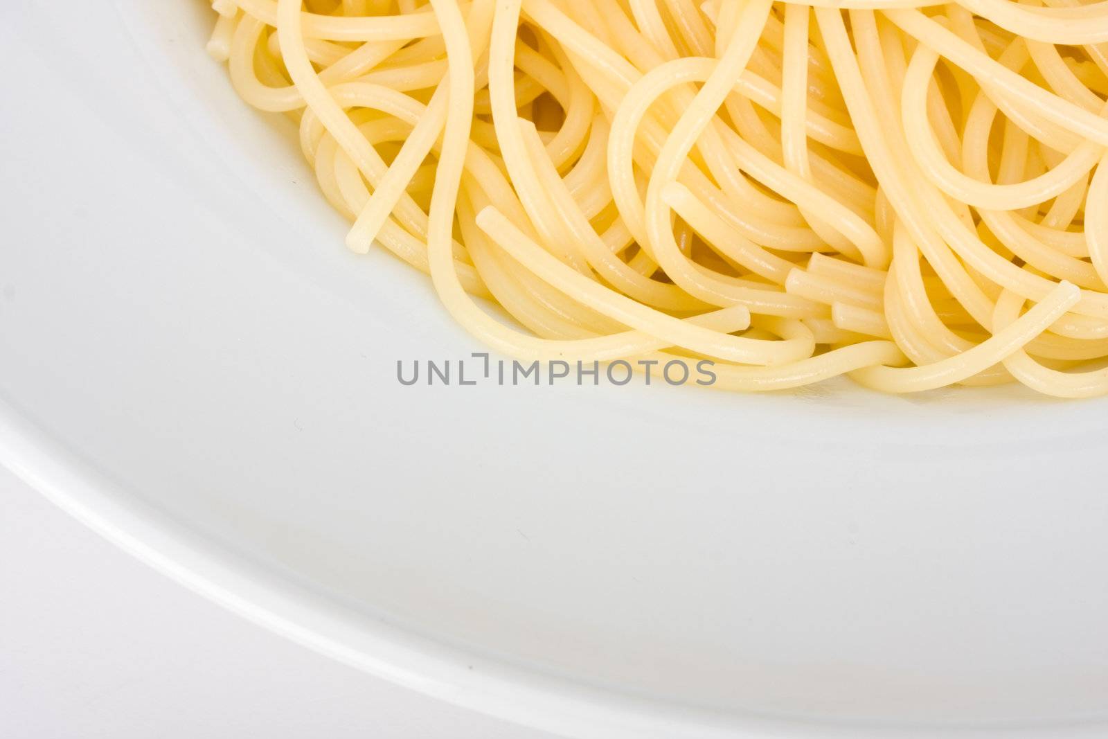 spaghetti in a white plate on clear background