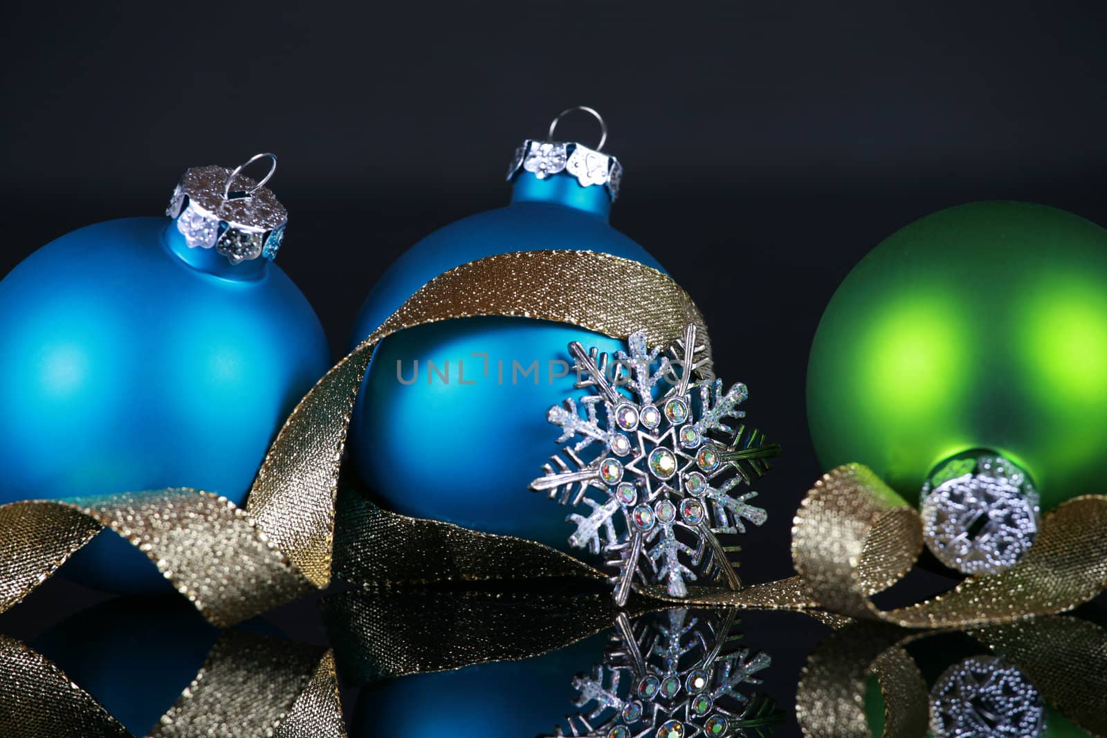 Christmas decorations  on black reflective background