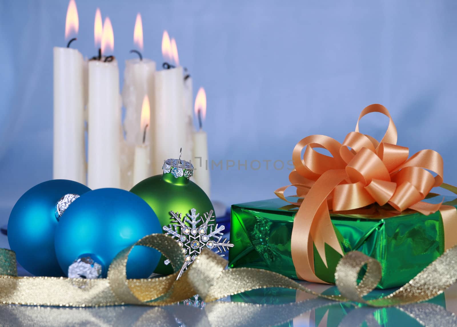 Christmas decorations on blue background , focus on foreground objects