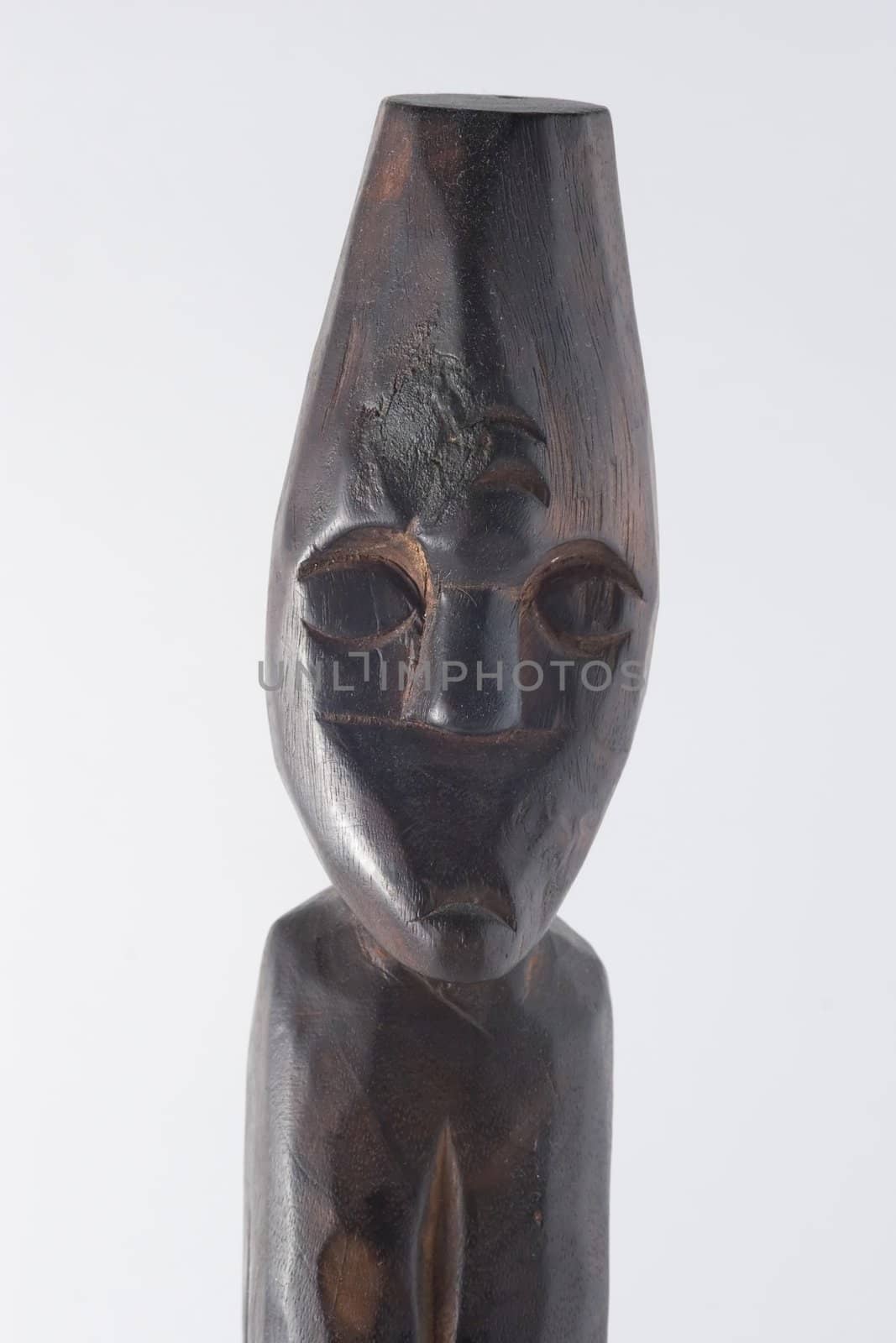In West Africa the figures have elongated bodies, angular shapes, and facial features that represent an ideal rather than an individual.