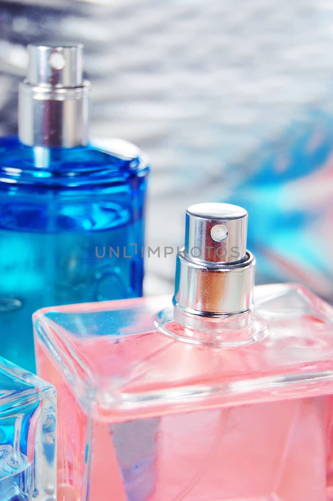 pink and blue perfume bottle detail