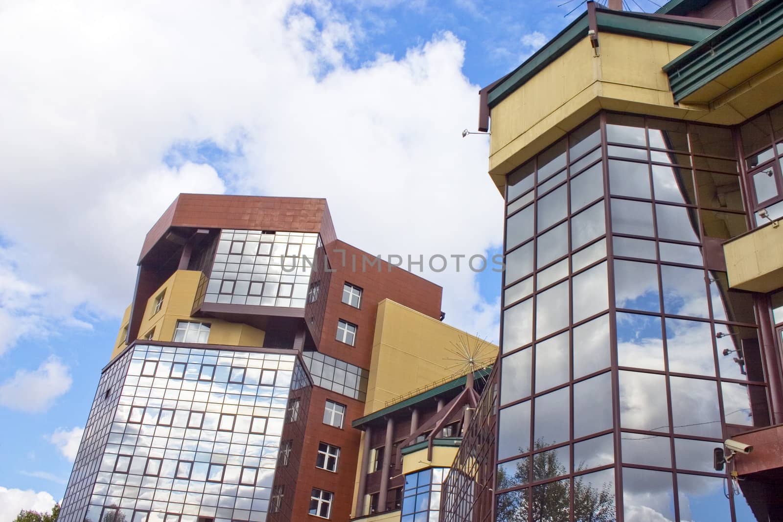 Modern building from a brick. Glass windows.