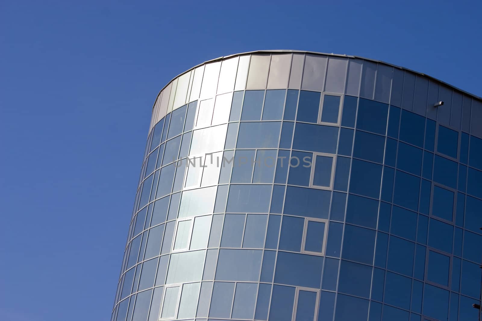 Modern urban building. Glass windows.