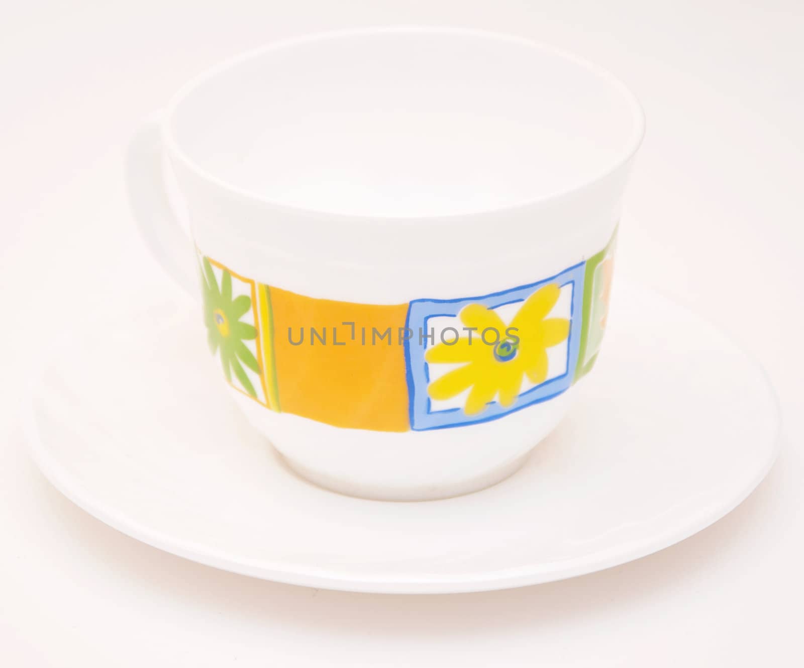 Empty tea cup saucer on white background