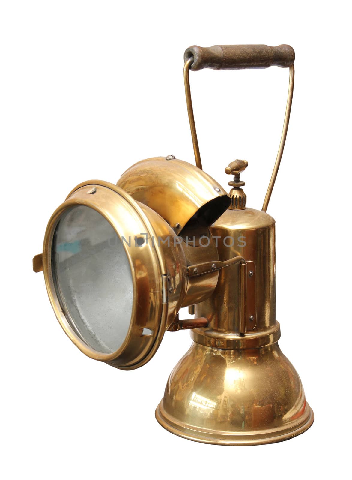 Old copper miner carbide lamp on a white background.