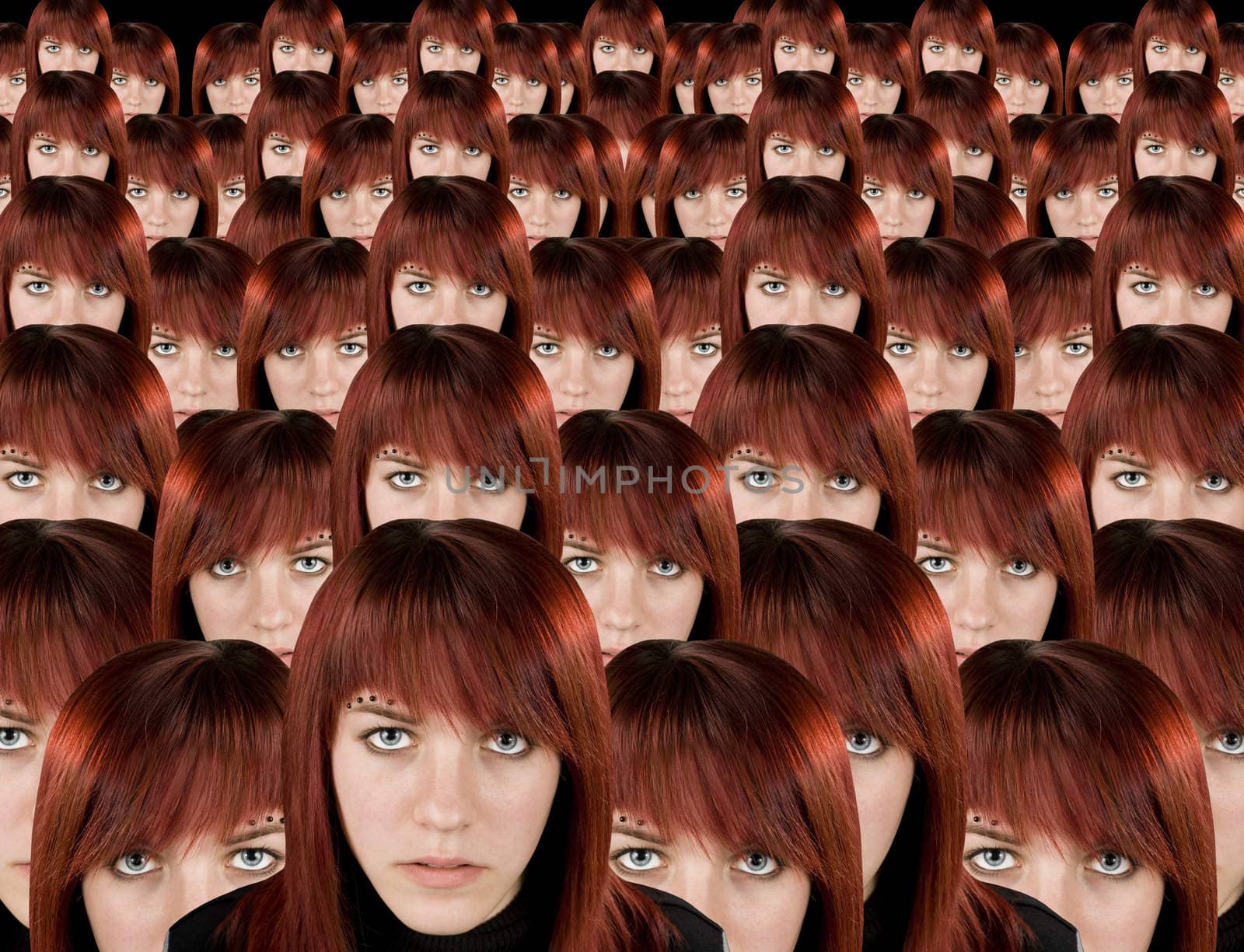 Beautiful redhead girl clones with piercing staring at camera.