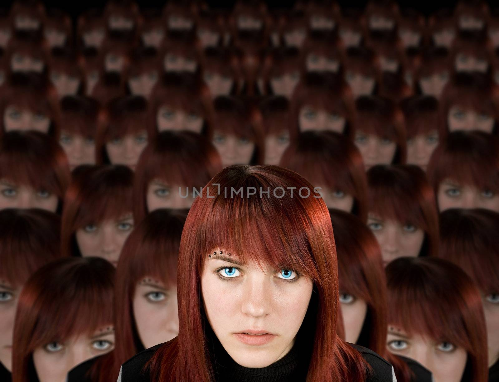 Beautiful redhead girl with piercing and hundred clones staring at camera.