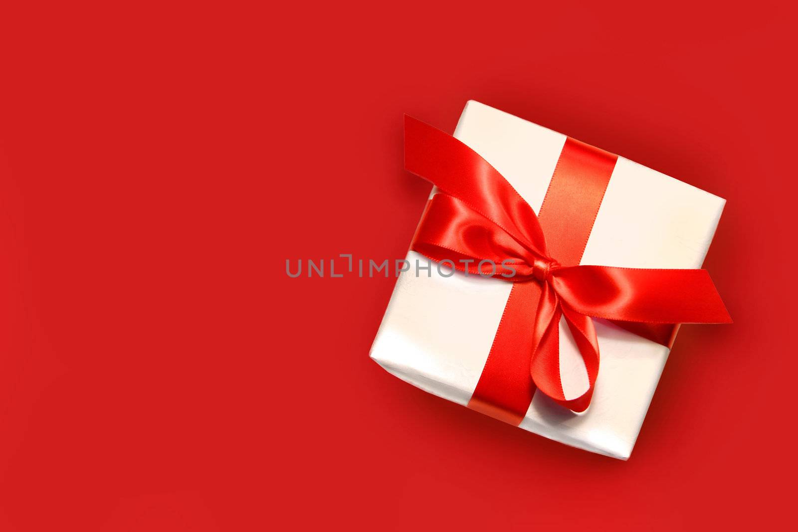 Little red gift isolated on white background