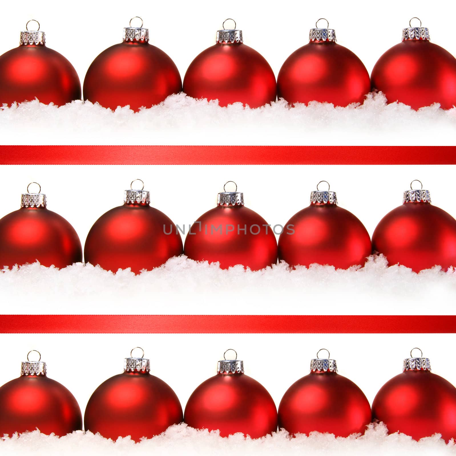 Red christmas balls with snow isolated on white background