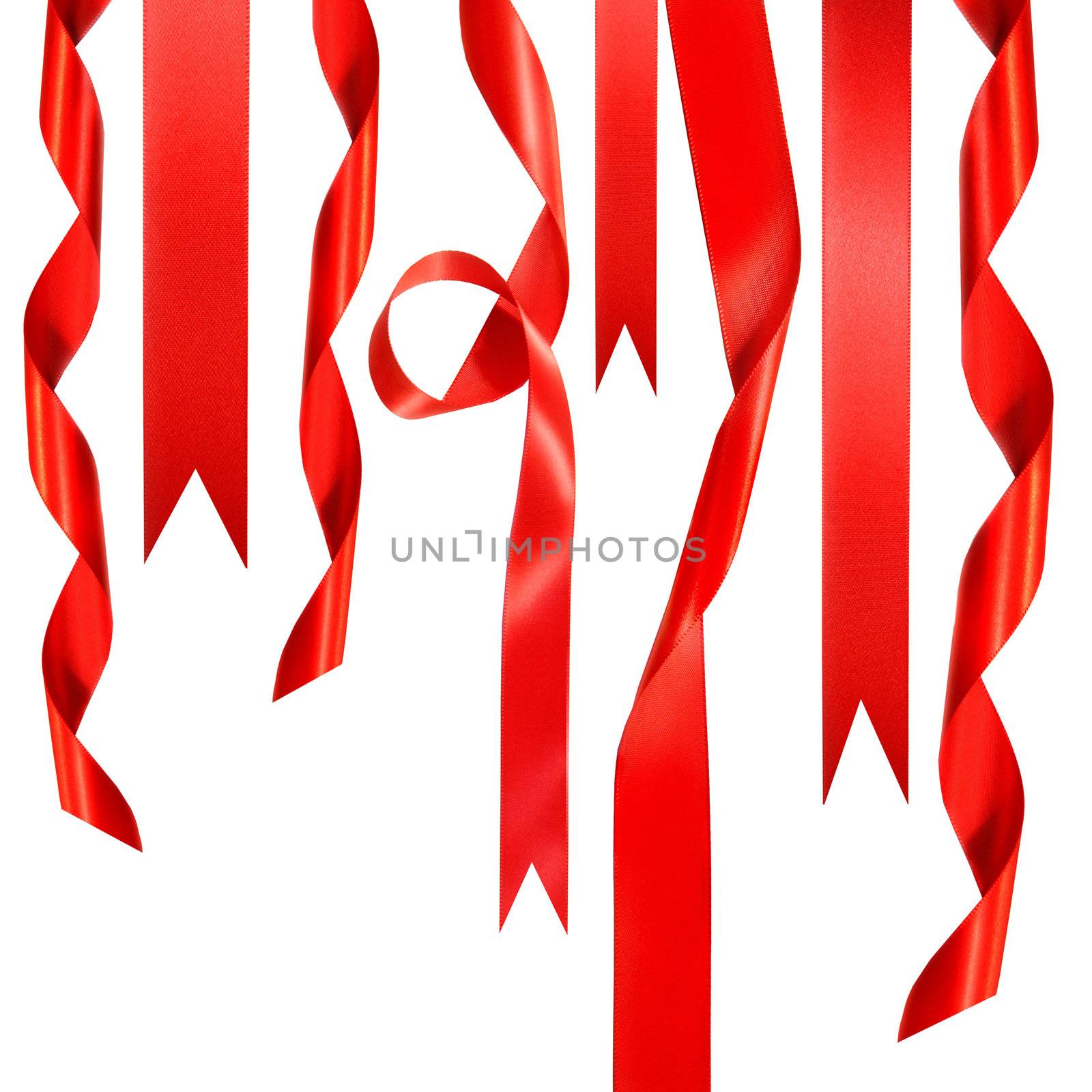 Red ribbons hanging down on white background