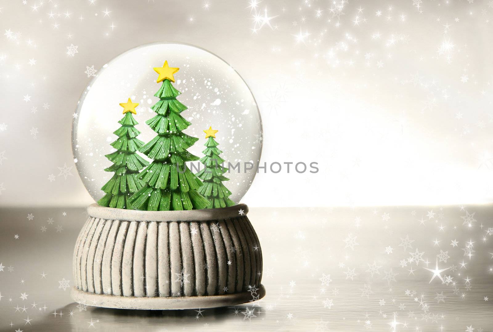 Snow globe against a silver background