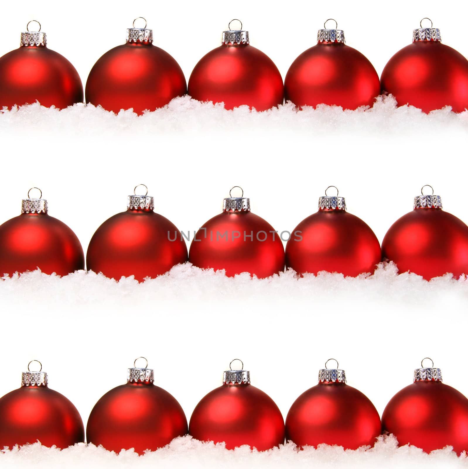 Red christmas balls with snow isolated on white by Sandralise