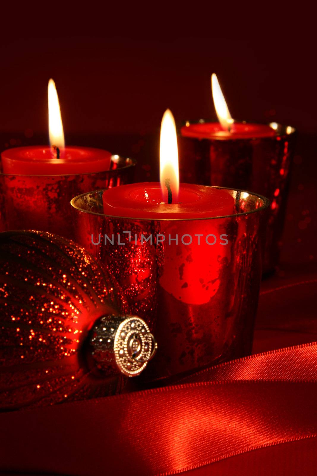 Red candles with ribbons by Sandralise