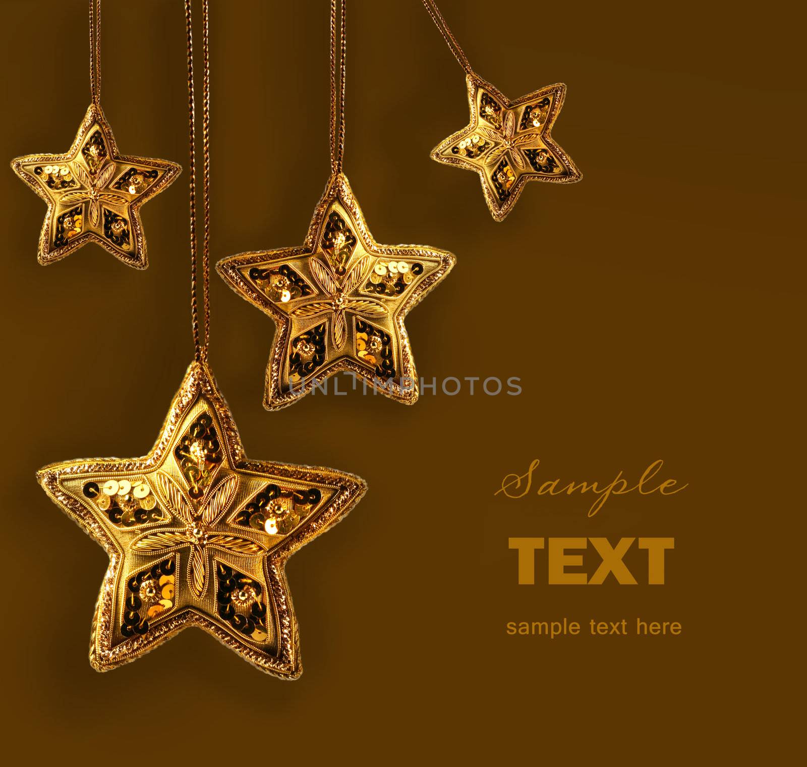 Gold beaded stars isolated on white abckground