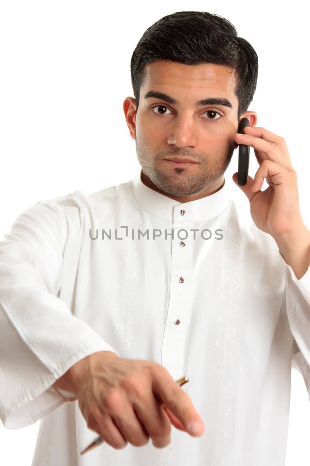 An arab middle eastern ethnic man pointing his finger.  He is wearing a traditional white robe eg kurta dishdasha.  White background.