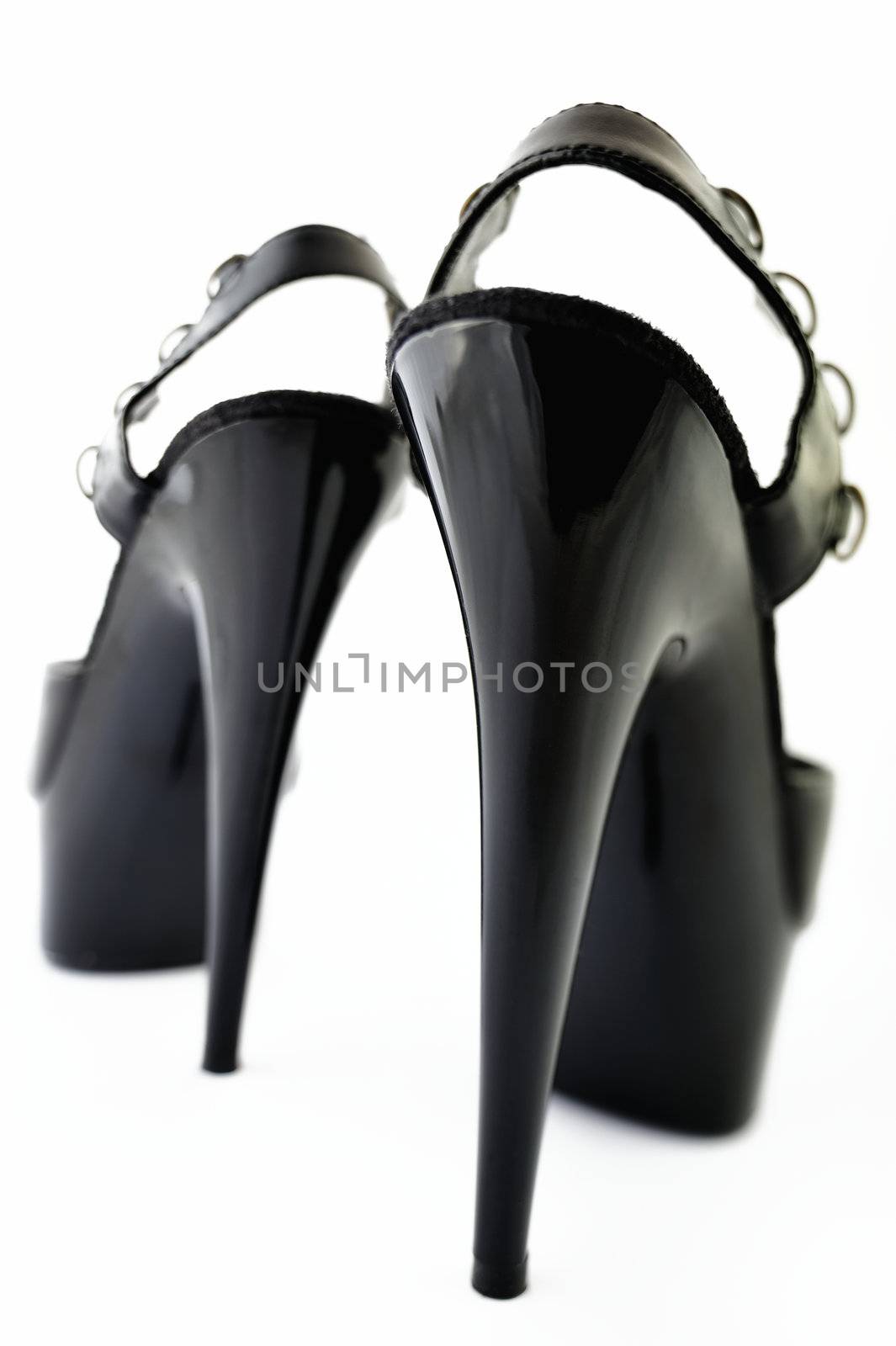 Elegant pair of women shoes, on high heels