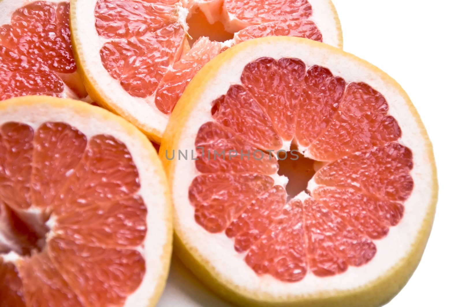 Cut slices of ripe, juicy fresh oranges. Isolation on white background.