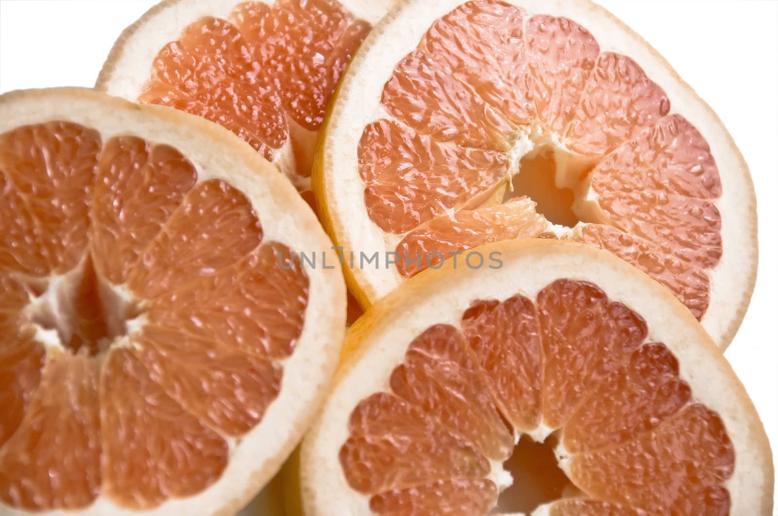 Cut slices of ripe, juicy fresh oranges. Isolation on white background.