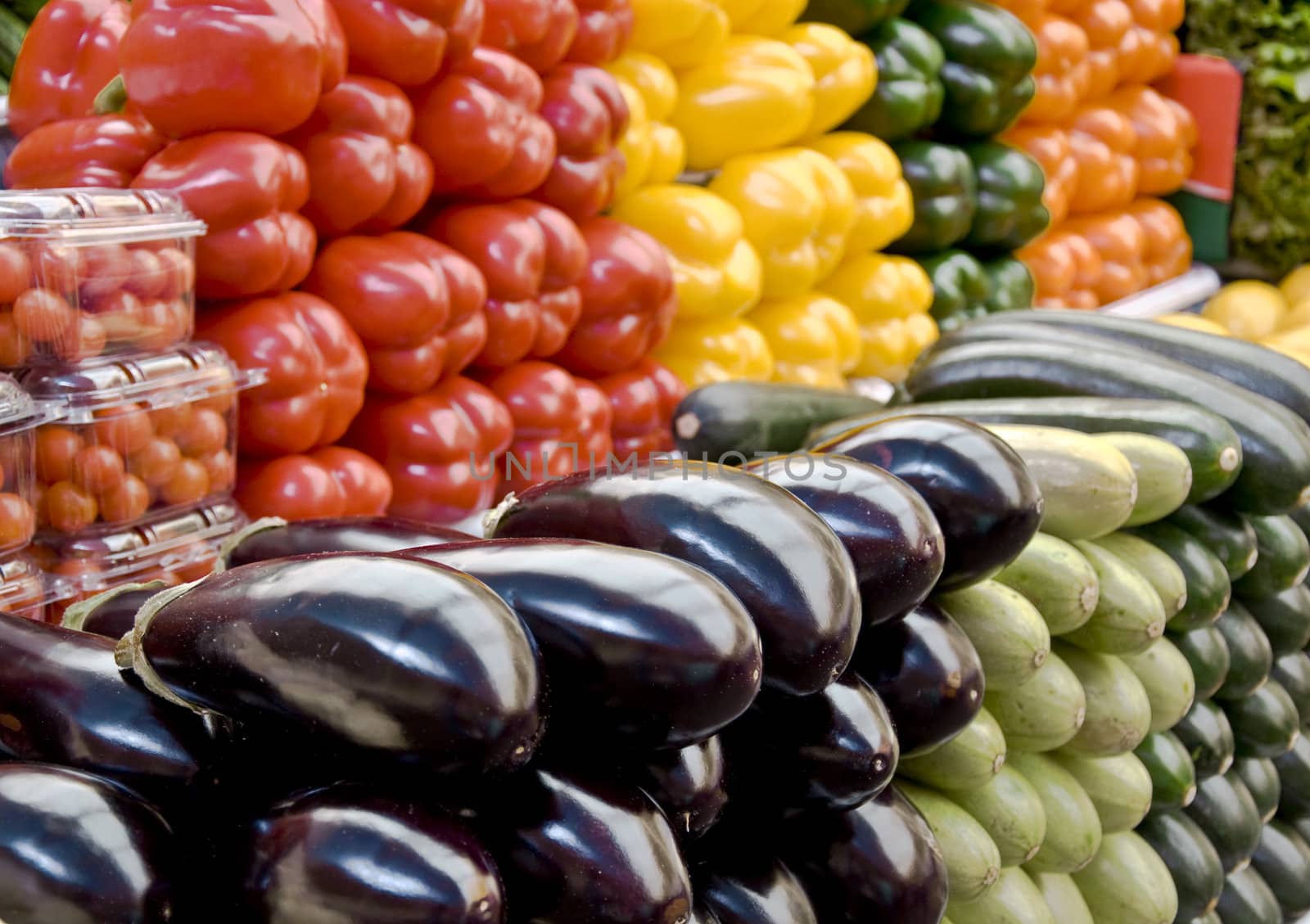 Multicolored particulars vegetables on the grocery market. Multicolored and freshness. Close-up, blurred focus