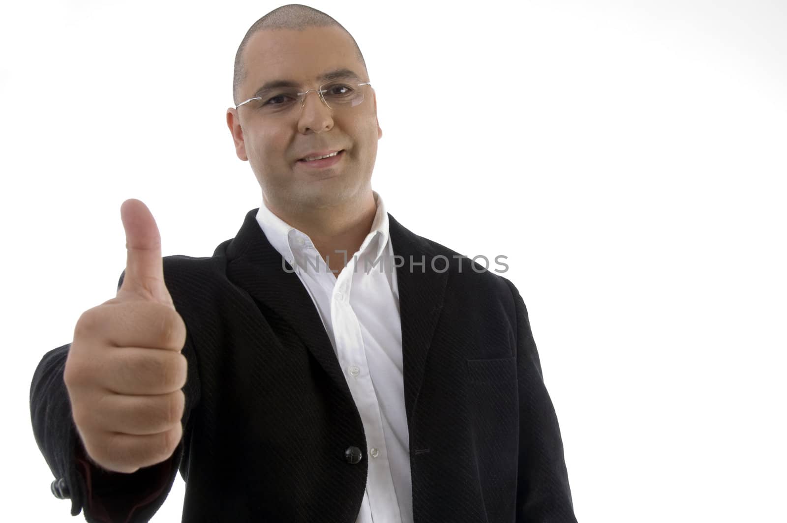 portrait of businessman with thumbs up by imagerymajestic